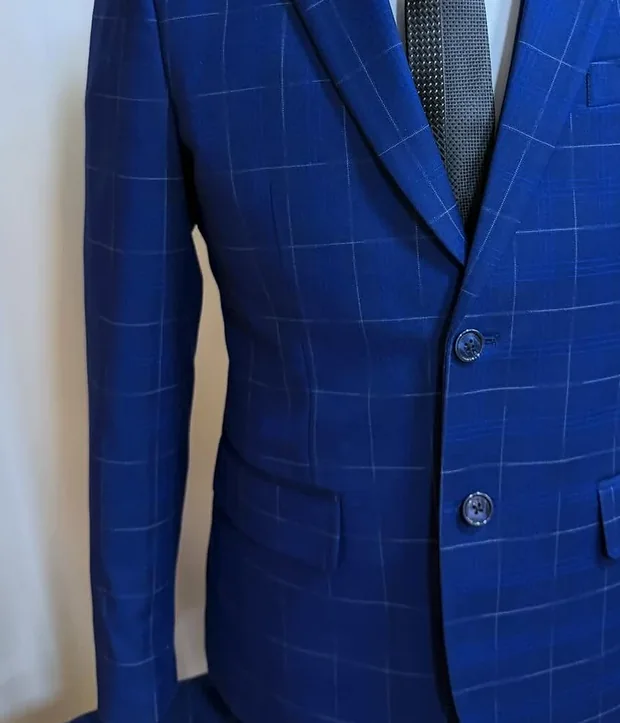 Blue windowpane fabric texture shown in finished S. PREMIERE tailoring