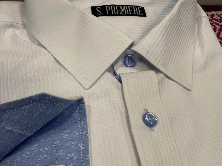 White shirt with contrast details