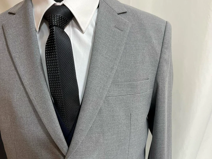 Grey tailored suit detail
